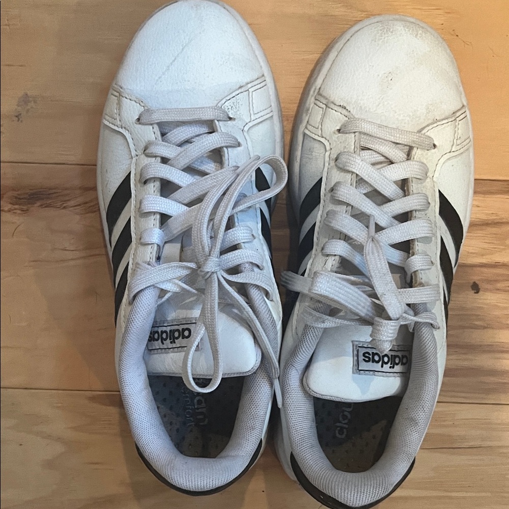 Adidas women’s White and Black Striped Sneakers